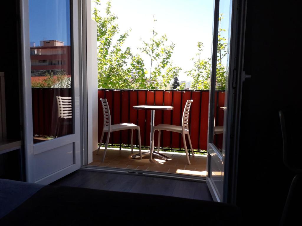 Balkón nebo terasa v ubytování Hotel Le Terminus