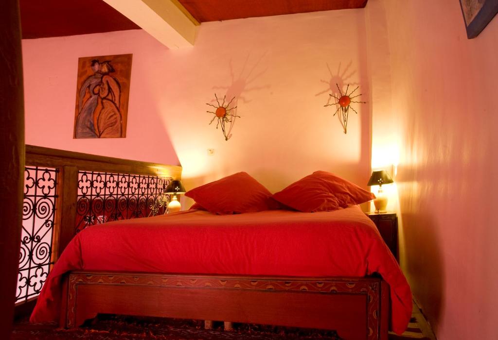 Postel nebo postele na pokoji v ubytování Riad Al Bartal