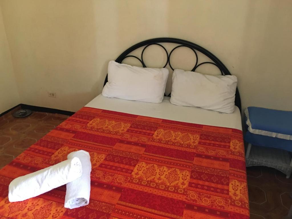 Postel nebo postele na pokoji v ubytování Guesthouse Cavite