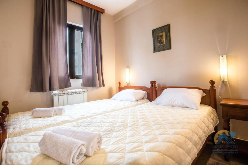 Postel nebo postele na pokoji v ubytování Mali Miločer Bay Accommodation