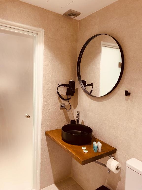 Koupelna v ubytování Hotel Papagalos