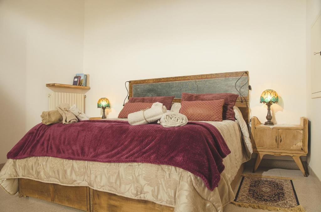 A bed or beds in a room at Palazzo Margherita
