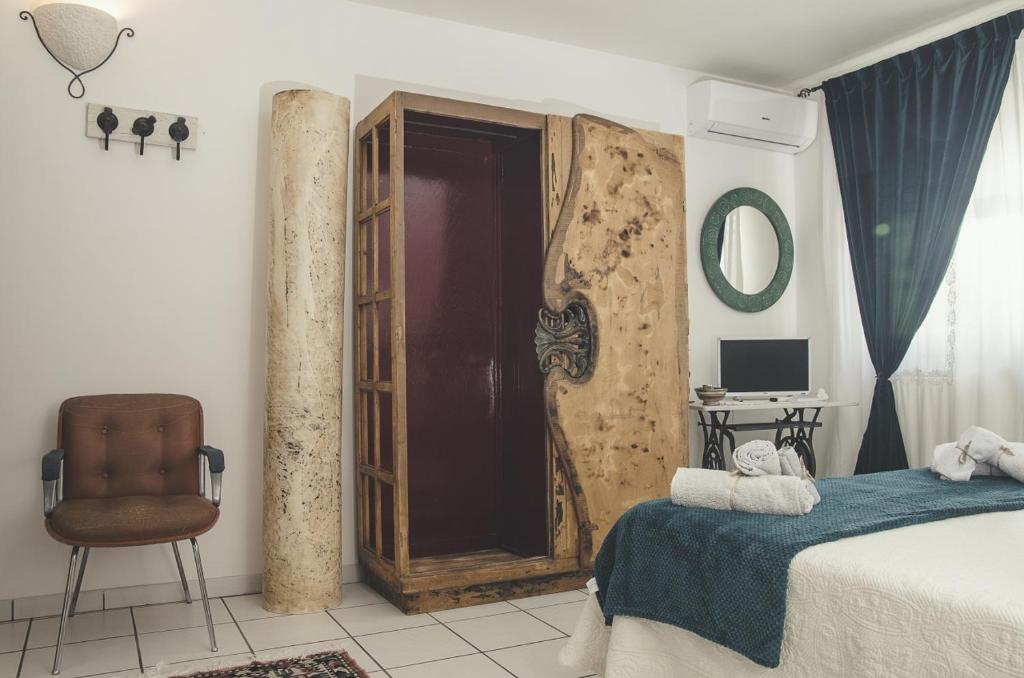 A bed or beds in a room at Palazzo Margherita
