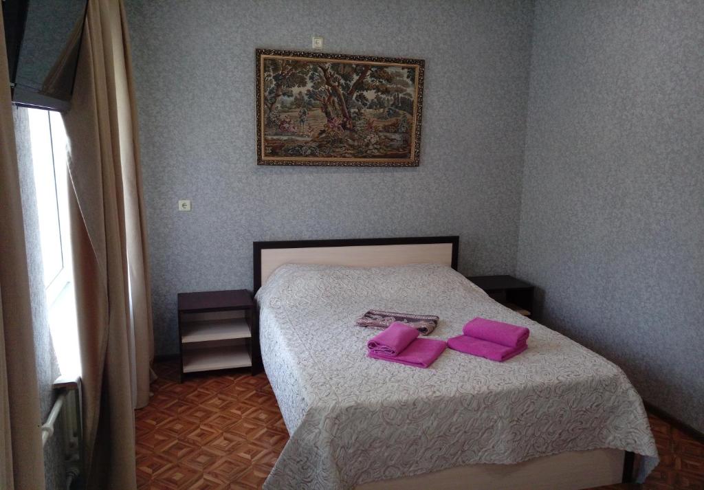 Postel nebo postele na pokoji v ubytování Premium Hotel