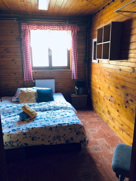 Postel nebo postele na pokoji v ubytování Chata u Kostela