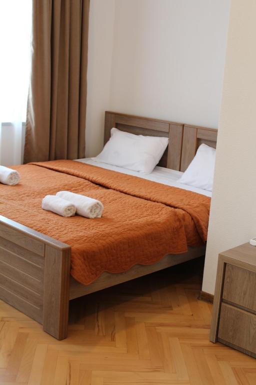 Postel nebo postele na pokoji v ubytování Guest House Chiko