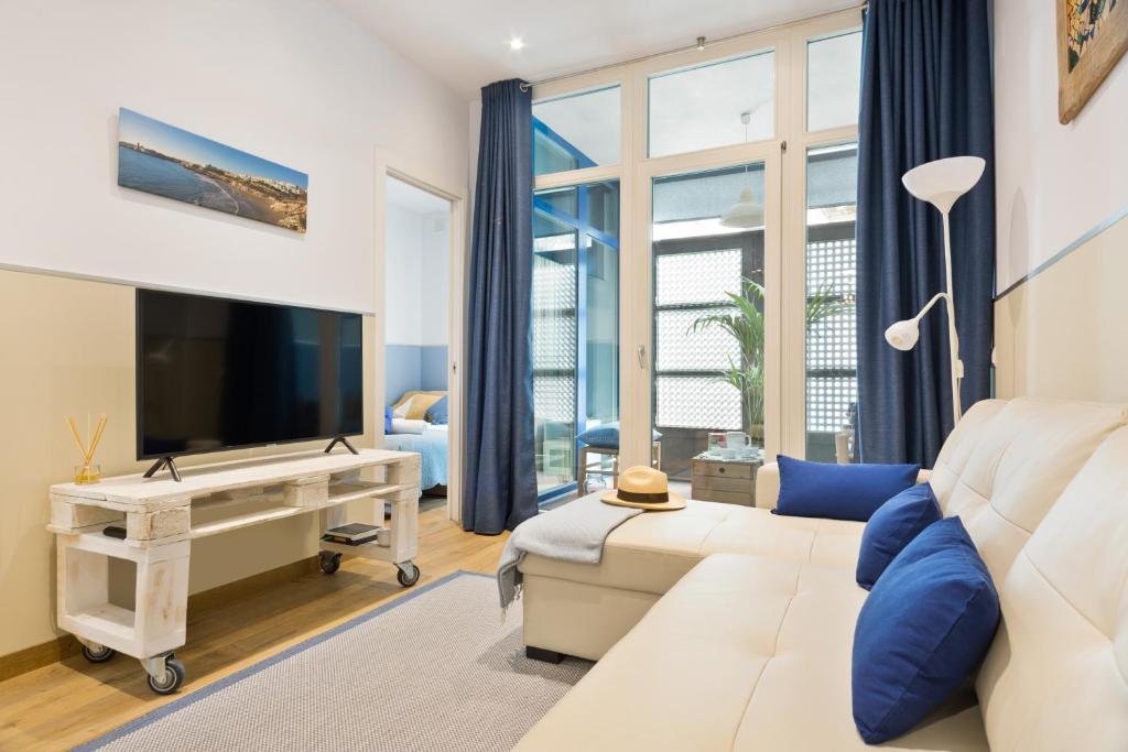 TV a/nebo společenská místnost v ubytování Sans Souci Quality Apartments