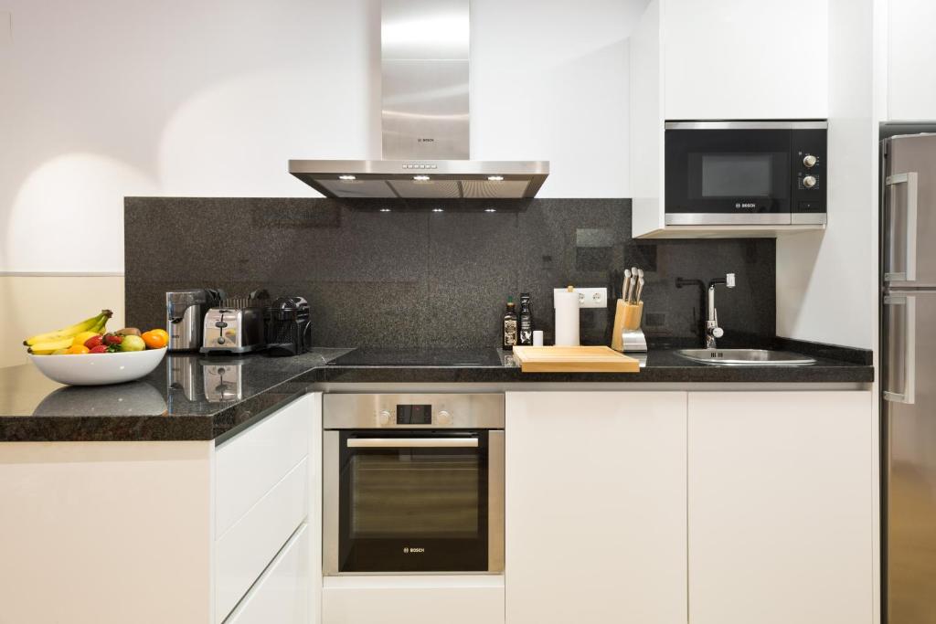 Kuchyň nebo kuchyňský kout v ubytování Sans Souci Quality Apartments