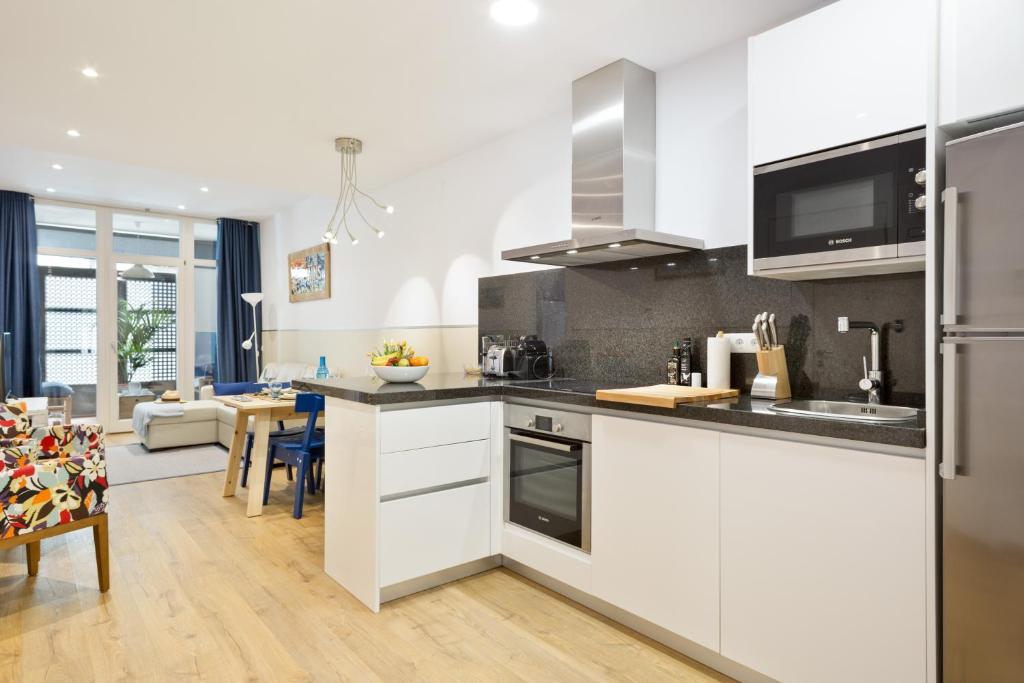 Kuchyň nebo kuchyňský kout v ubytování Sans Souci Quality Apartments