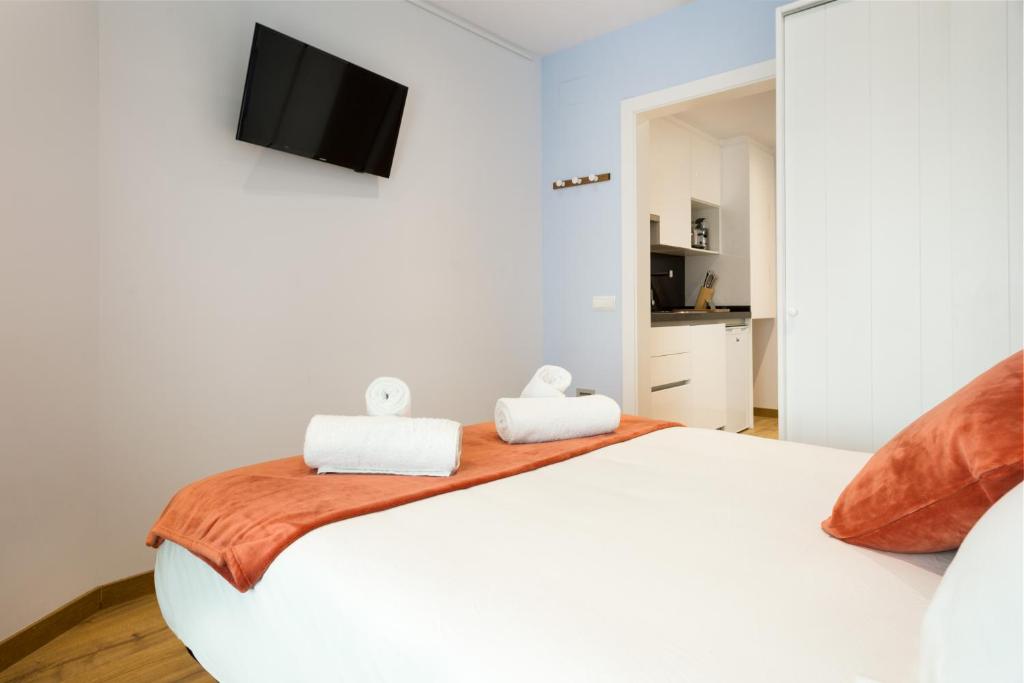Postel nebo postele na pokoji v ubytování Sans Souci Quality Apartments