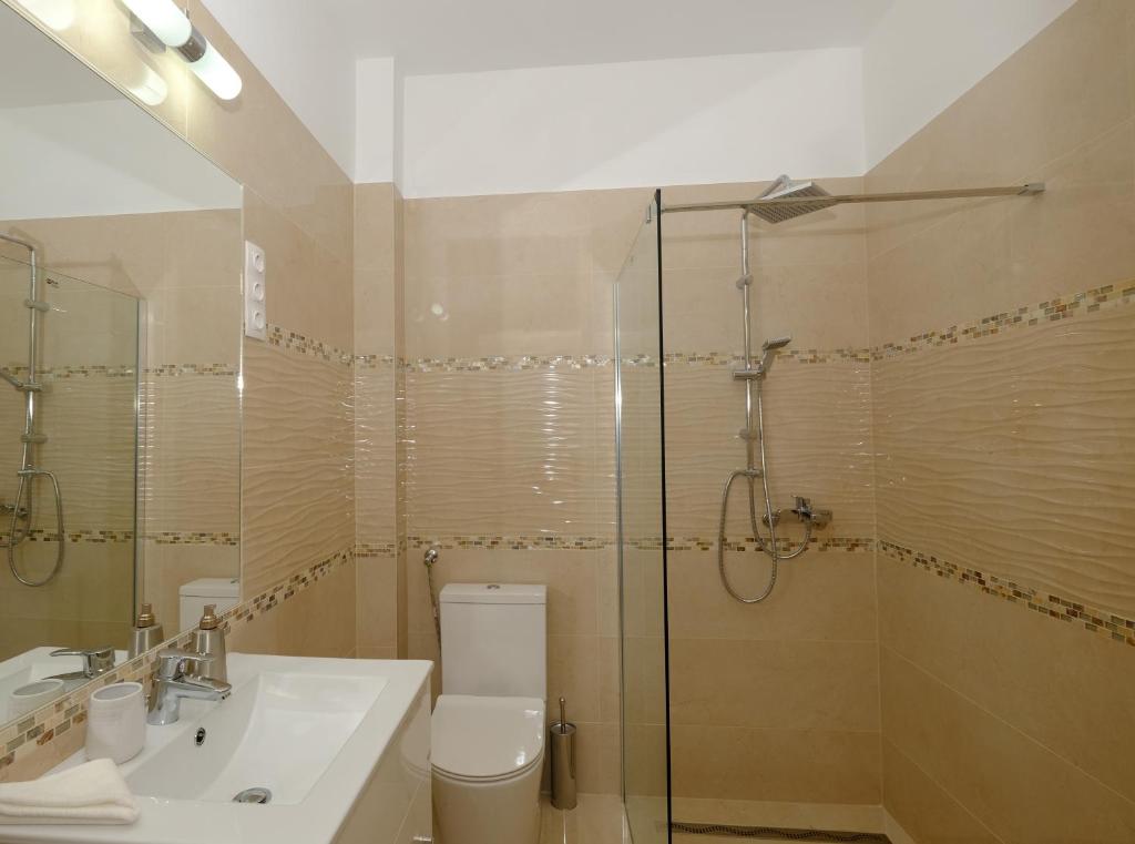 Łazienka w obiekcie Mária Apartman Pécs