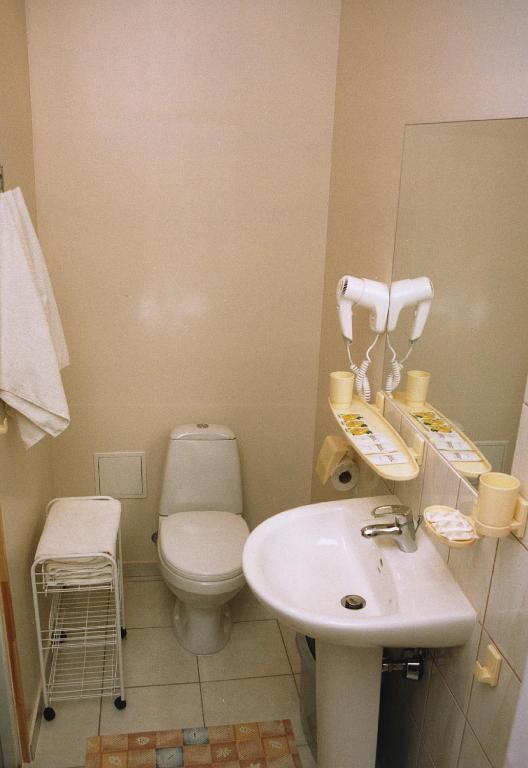 Koupelna v ubytování Gamma Hotel