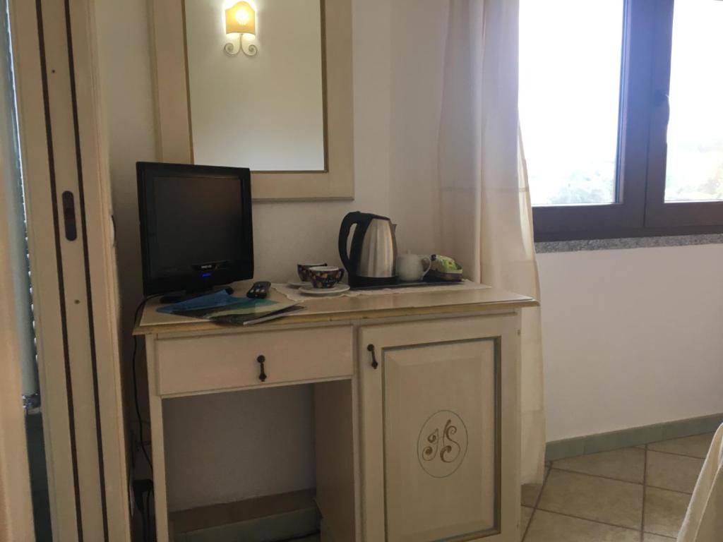 Kuchyň nebo kuchyňský kout v ubytování Hotel Sorgente