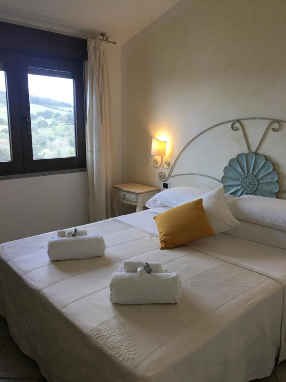 Posteľ alebo postele v izbe v ubytovaní Hotel Sorgente