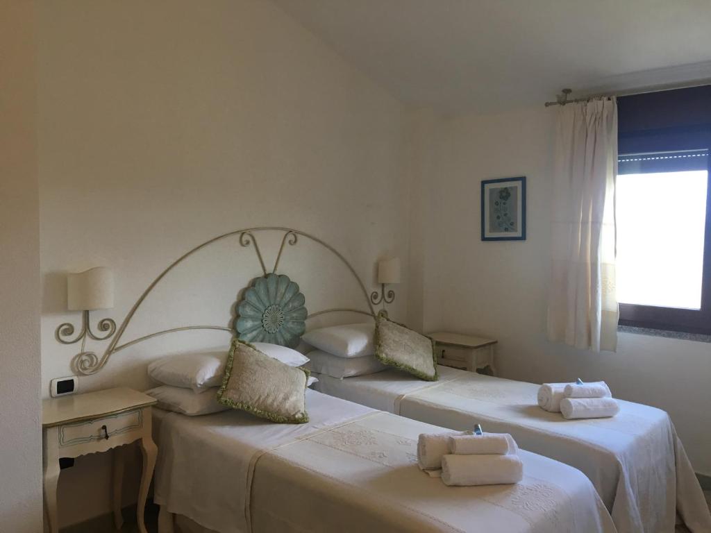 Postel nebo postele na pokoji v ubytování Hotel Sorgente