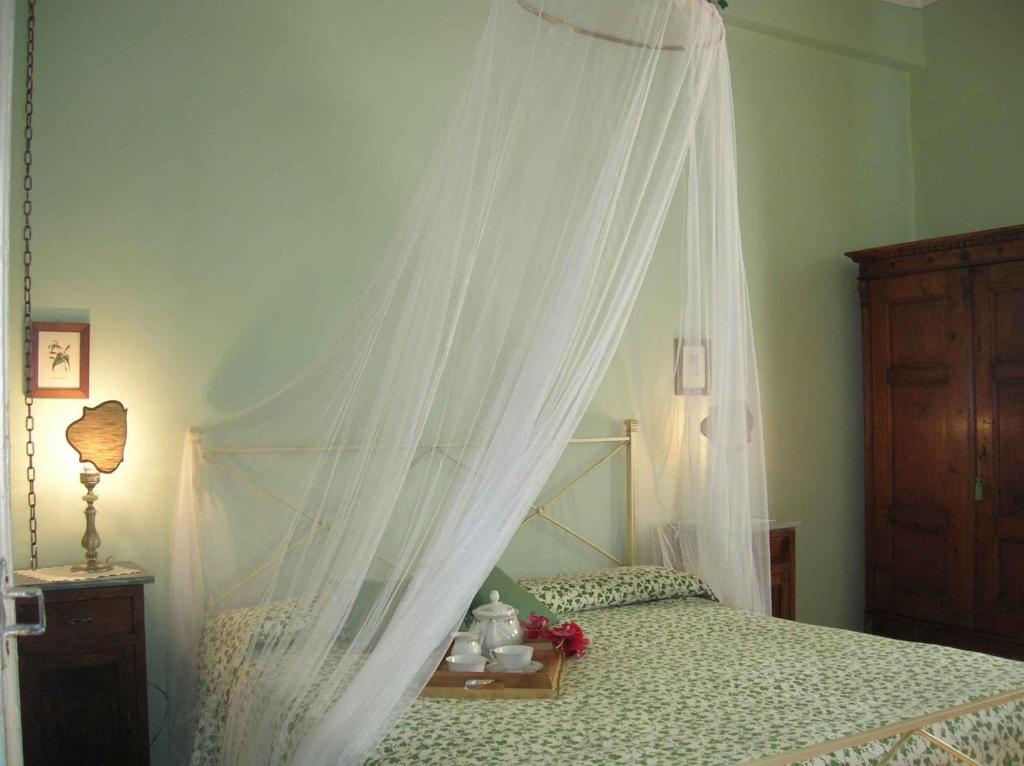Postel nebo postele na pokoji v ubytování Villa Mustafà