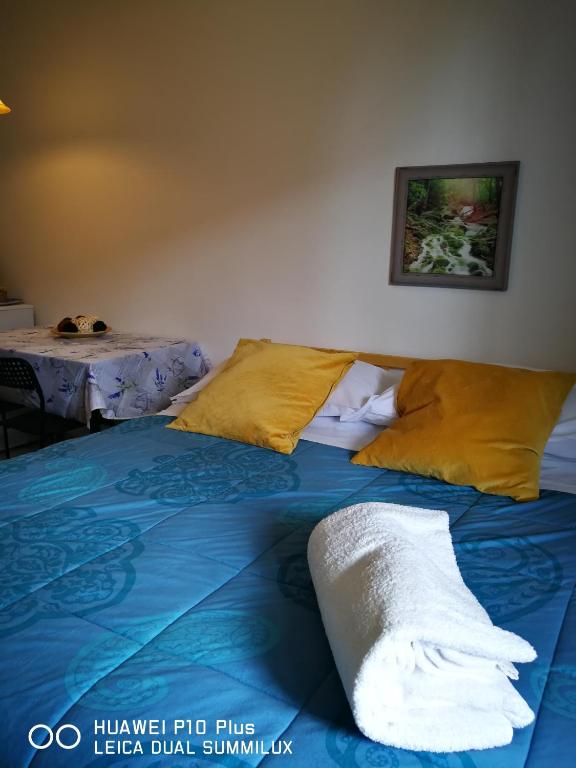 Posteľ alebo postele v izbe v ubytovaní Villa Galilei Rooms