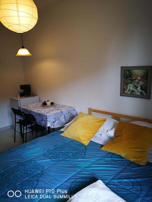 Posteľ alebo postele v izbe v ubytovaní Villa Galilei Rooms
