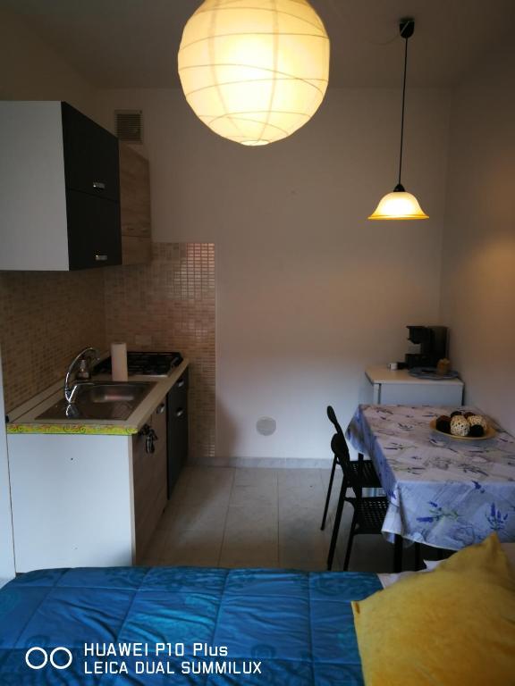Kuchyňa alebo kuchynka v ubytovaní Villa Galilei Rooms