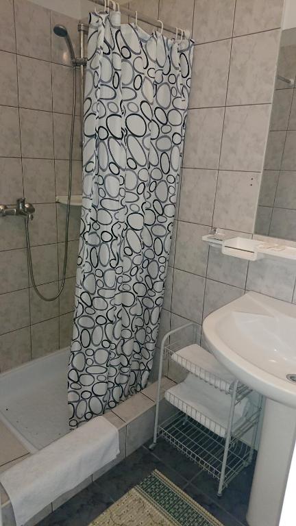 Koupelna v ubytování Gamma Hotel