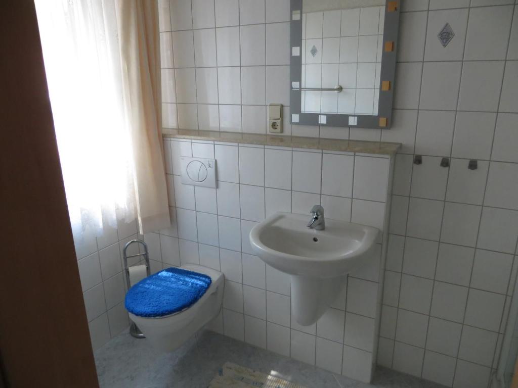 Koupelna v ubytování Ferienwohnung & Zimmervermietung Wolf