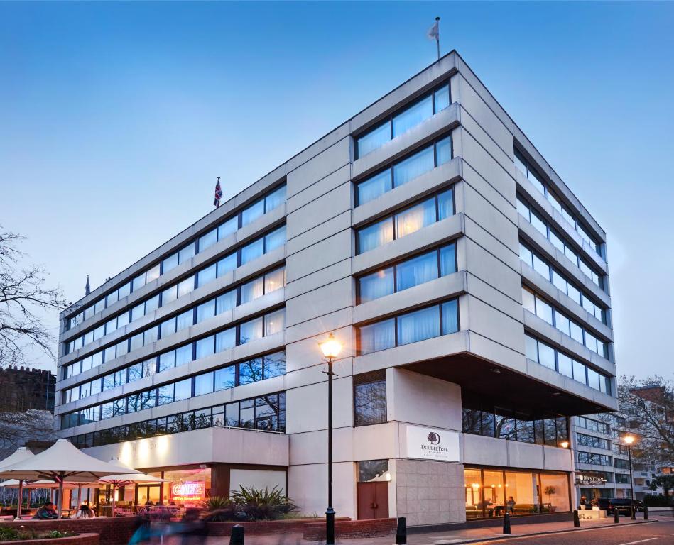 a large office building with a lot of windows at DoubleTree by Hilton London - Hyde Park in London