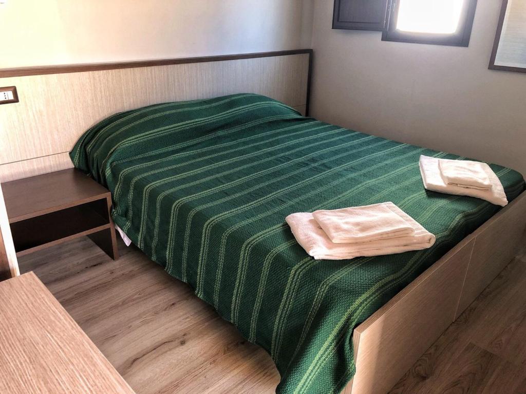 Postel nebo postele na pokoji v ubytování Populus