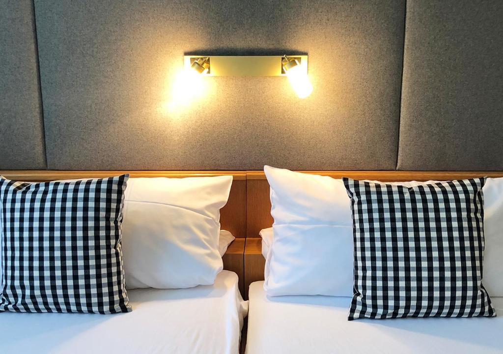 Postel nebo postele na pokoji v ubytování Mangolds Boutique Hotel & Fruehstuecksmeisterei
