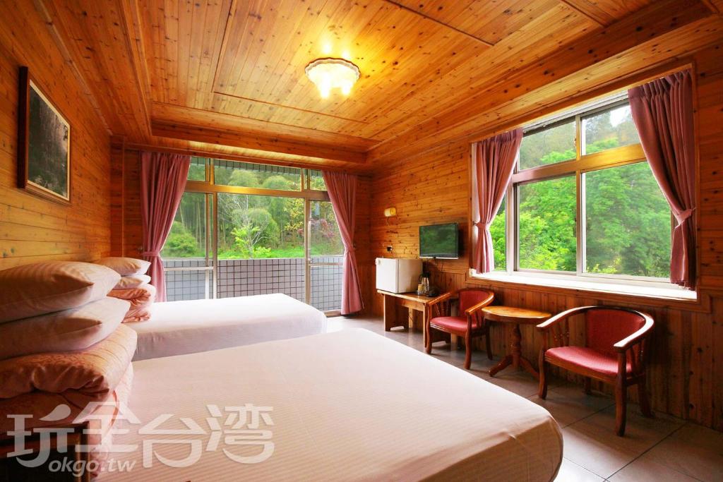 Postel nebo postele na pokoji v ubytování Xi Zhi Tou Homestay