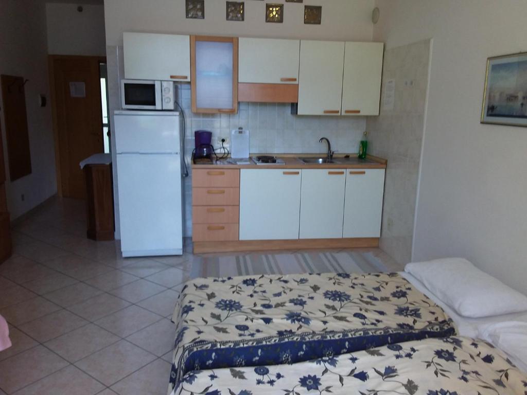 Kuchyň nebo kuchyňský kout v ubytování Residence Cascata Varone