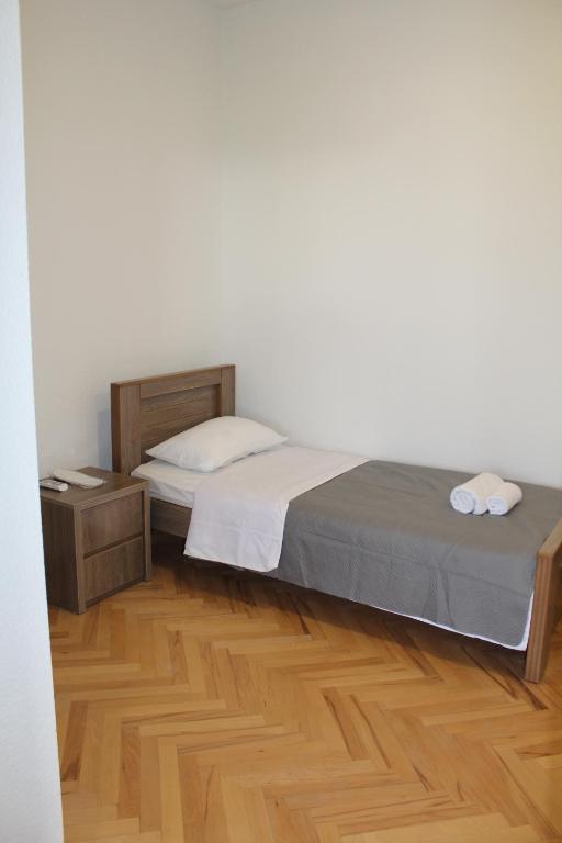 Postel nebo postele na pokoji v ubytování Guest House Chiko
