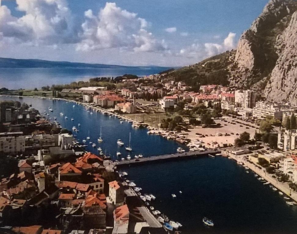 a view of a harbor with boats in the water at Apartman Renata in Omiš