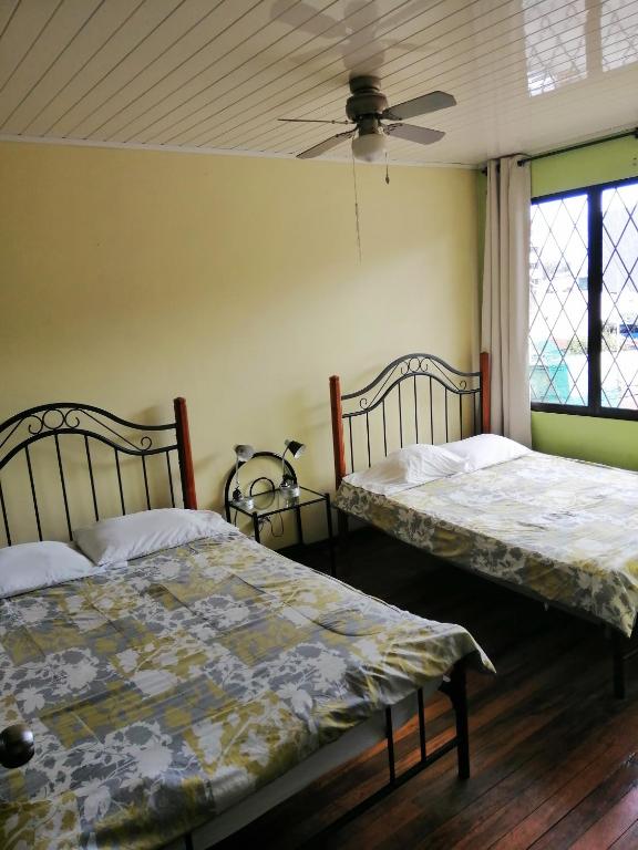 Postel nebo postele na pokoji v ubytování Casa Leon Guesthouse