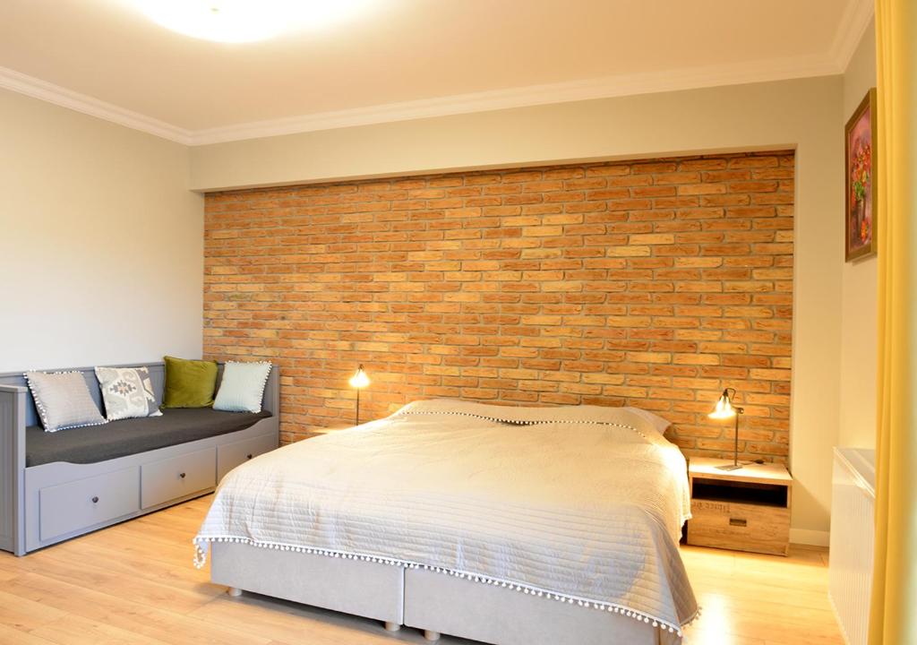 Postel nebo postele na pokoji v ubytování Apartamenty Gaja