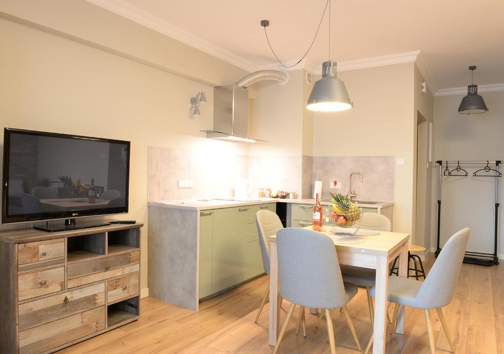 TV a/nebo společenská místnost v ubytování Apartamenty Gaja