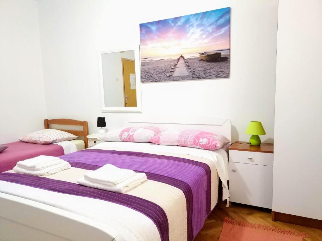 Postel nebo postele na pokoji v ubytování Zadar Peninsula Accommodation