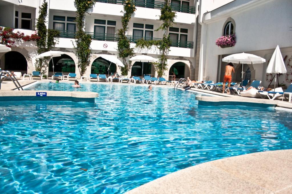 A piscina em ou perto de Hotel Suave Mar