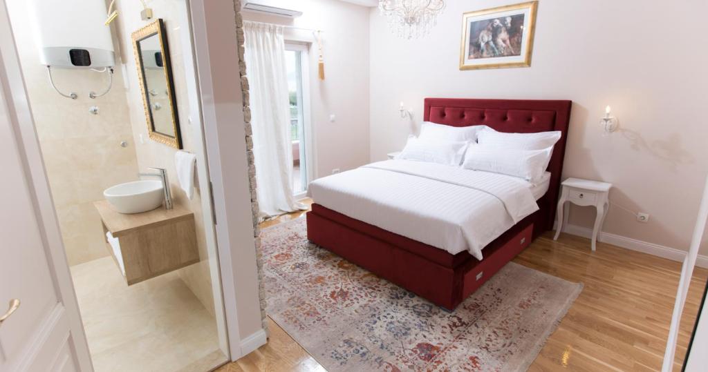 Postel nebo postele na pokoji v ubytování San Mihael luxury rooms 1