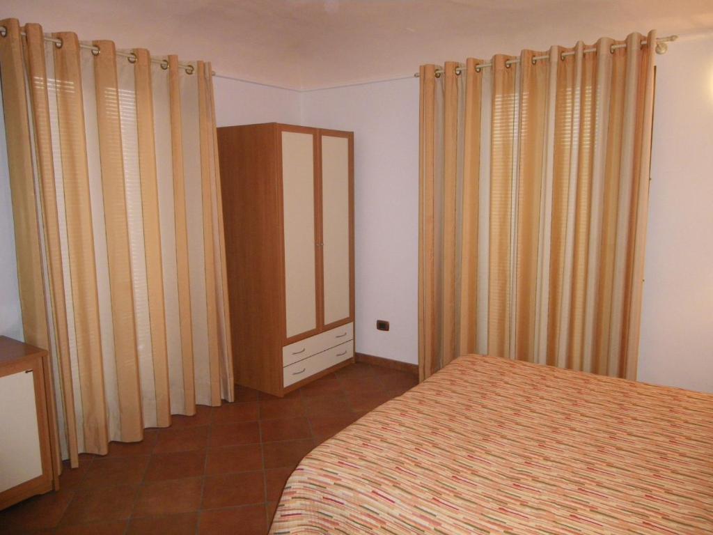 Postel nebo postele na pokoji v ubytování Il Rustico