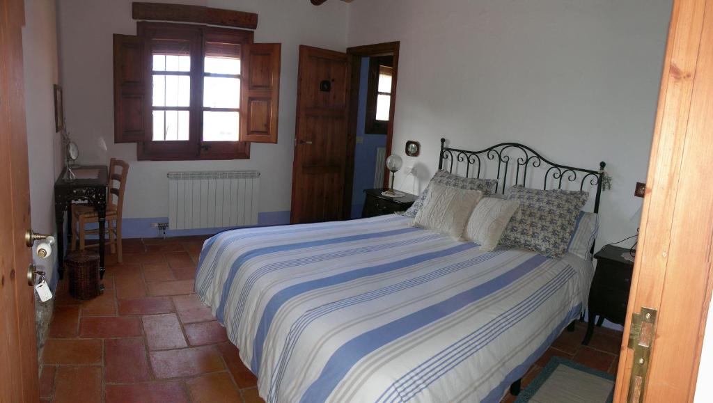 Postel nebo postele na pokoji v ubytování Mas del Salin