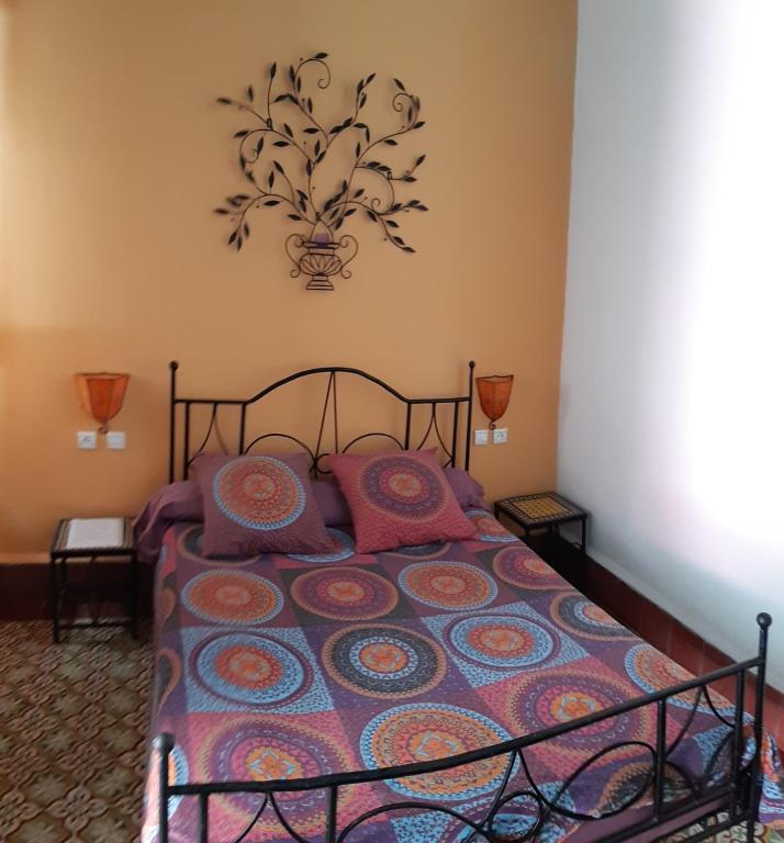 Postel nebo postele na pokoji v ubytování Riad Sidi Magdoul