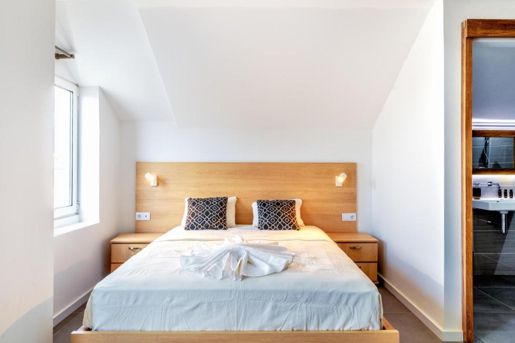 Postel nebo postele na pokoji v ubytování Art Hotel