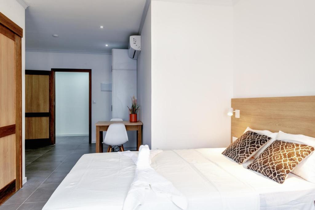 Postel nebo postele na pokoji v ubytování Art Hotel
