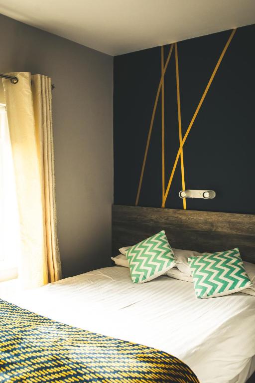 Postel nebo postele na pokoji v ubytování Kerrigan's B&B