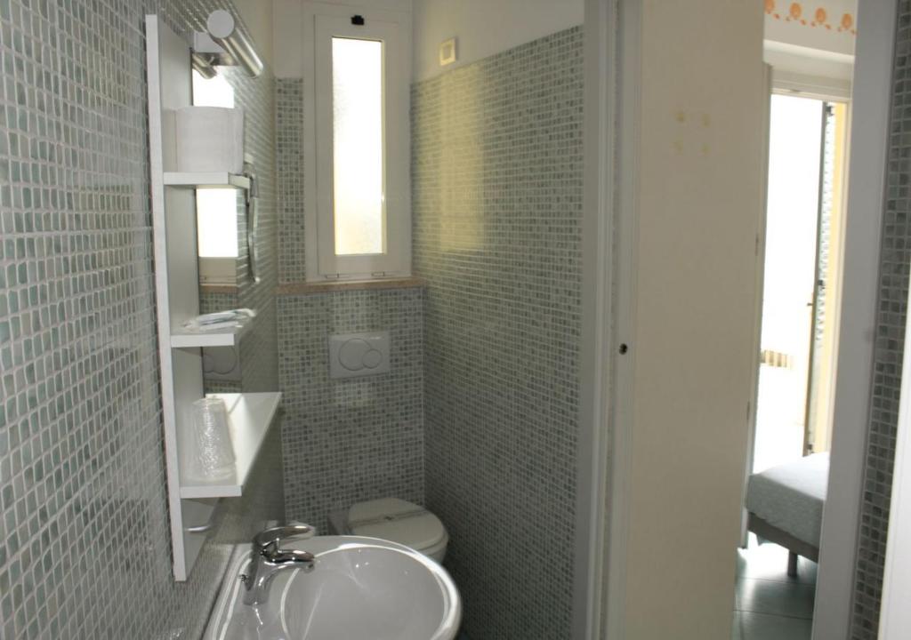 Koupelna v ubytování Hotel Residence Arturo