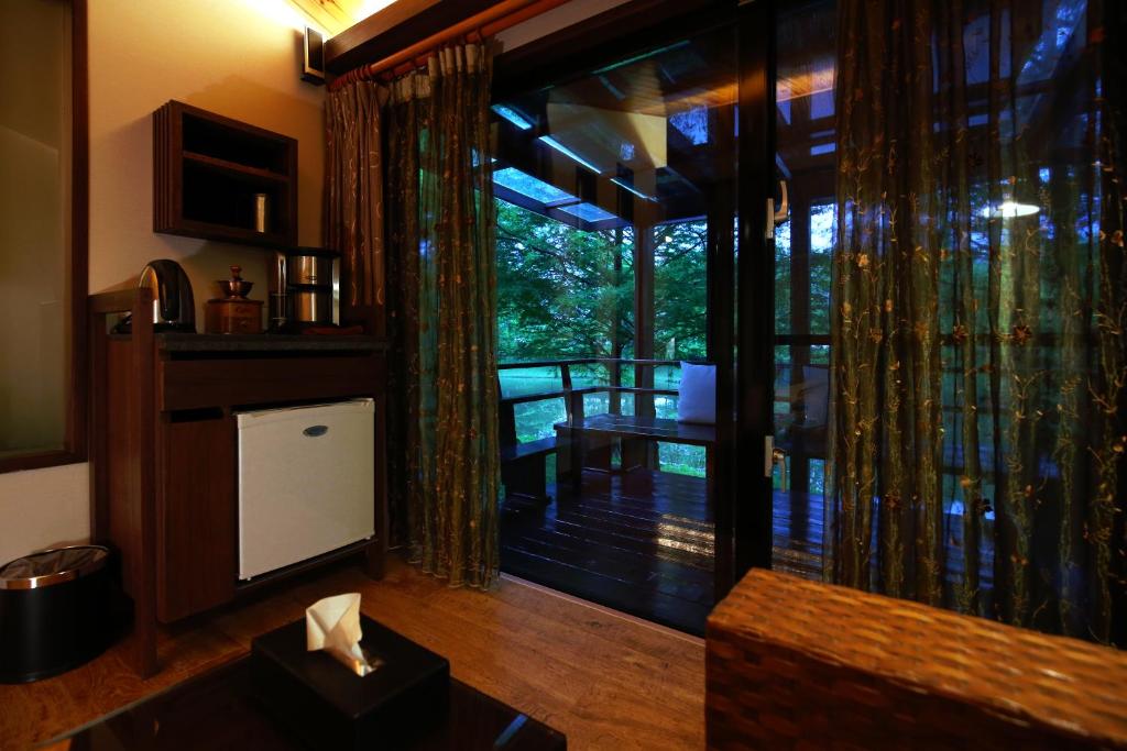 Kuchyň nebo kuchyňský kout v ubytování Grace Garden Villa