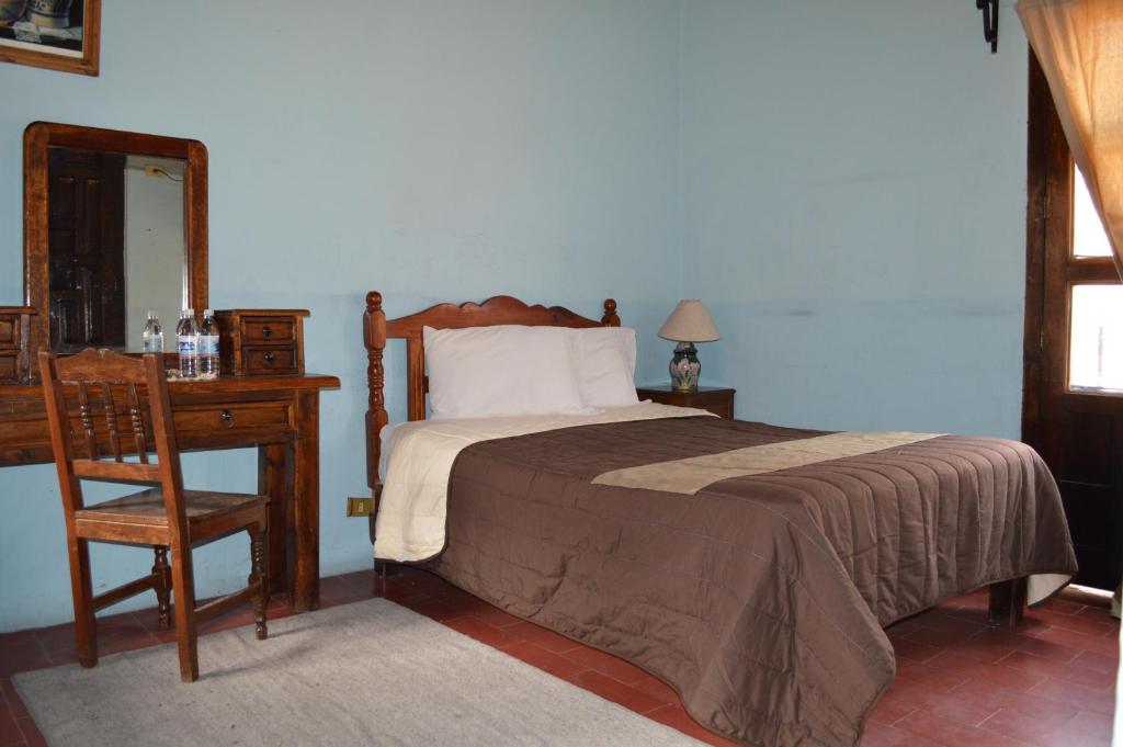 Postel nebo postele na pokoji v ubytování Hotel Dos Rios