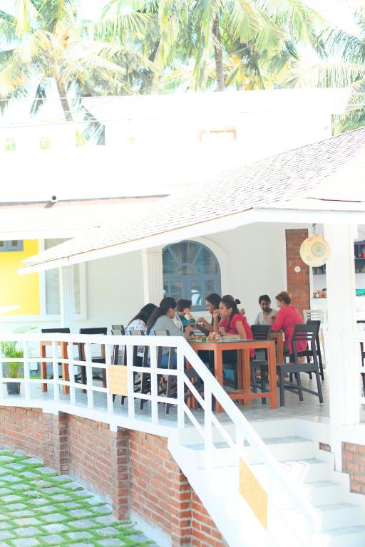 Balkón nebo terasa v ubytování Magnolia Guesthouse Varkala