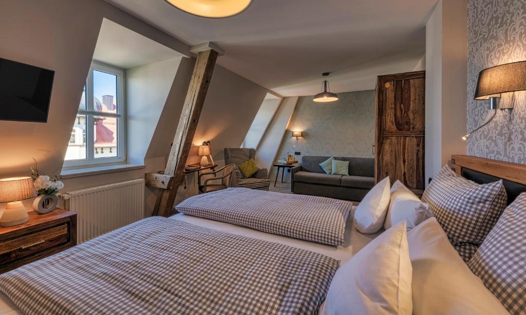 Postel nebo postele na pokoji v ubytování Hotel Starnberger See