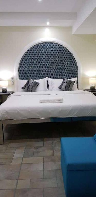 Postel nebo postele na pokoji v ubytování Cess Summer Boutique Hotel